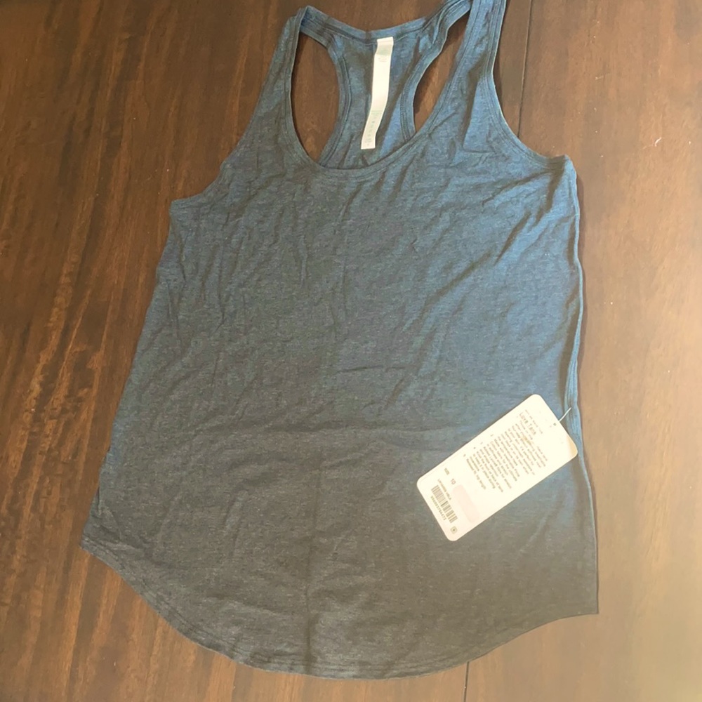 Brand new never used LOVE tank Lululemon sz 10